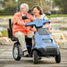 AFIKIM Afiscooter S4 Breeze Duo 4-Wheel Electric Mobility Scooter - Twin Seater Mobility Scooter Front View with Couple