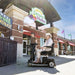 A woman riding the Amigo Viva Scooter 
