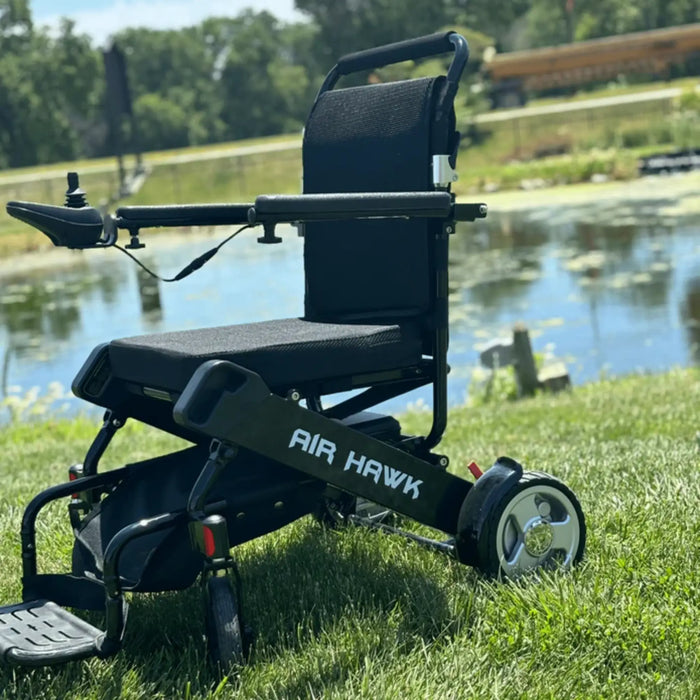 Discover Mobility Air Hawk Foldable Electric Power Wheelchair - Black Outdoor View