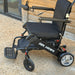 Discover Mobility Air Hawk Foldable Electric Power Wheelchair - Black Outdoor View