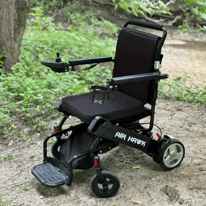 Discover Mobility Air Hawk Foldable Electric Power Wheelchair - Black Outdoor View