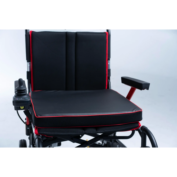 Black and red wheelchair with a cushion on a white background Feather Power Wheelchair 