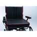 Black and red wheelchair with a cushion on a white background Feather Power Wheelchair 