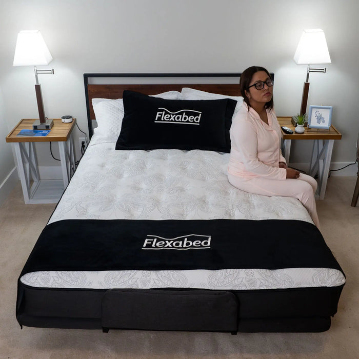 Flexabed Premier Full Electric Adjustable Bed - Luxury Type Bed with Mattress Person Sitting at the Side