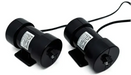 Two black cylindrical devices with labels on a white background Flexabed_Massage_Module