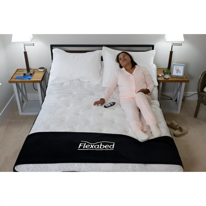 An individual enjoying the massage option of the Flexabed adjustable bed