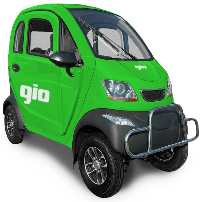 Green GIO Enclosed Mobility Scooter with enclosed weatherproof cabin, front bumper guard, windshield wiper, and compact electric mobility design.
