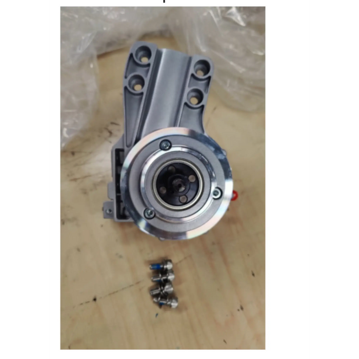 The 08396RGT (Right Side) and 08396LFT (Left Side) zoomer  motor assemblies&nbsp; replacement metallic industrial mechanical component with a circular opening and mounting holes, shown on a light wood surface with small hardware pieces below it.