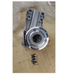 The 08396RGT (Right Side) and 08396LFT (Left Side) zoomer  motor assemblies&nbsp; replacement metallic industrial mechanical component with a circular opening and mounting holes, shown on a light wood surface with small hardware pieces below it.