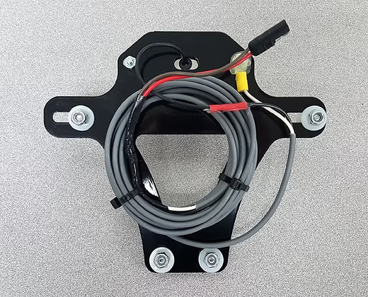 Black metal bracket with coiled gray cable on a gray background wheelchair carrier scooter lift