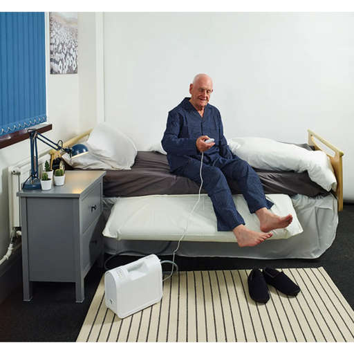 Mangar Leglifter with airflow man sitting on bed with remote