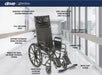 A DeVilbiss Drive siver sport reclining wheelchair shown in a bright modern hallway with callout labels pointing to features such as headrest extension, full reclining back, padded armrests, swing-away leg rests, and carbon steel frame.