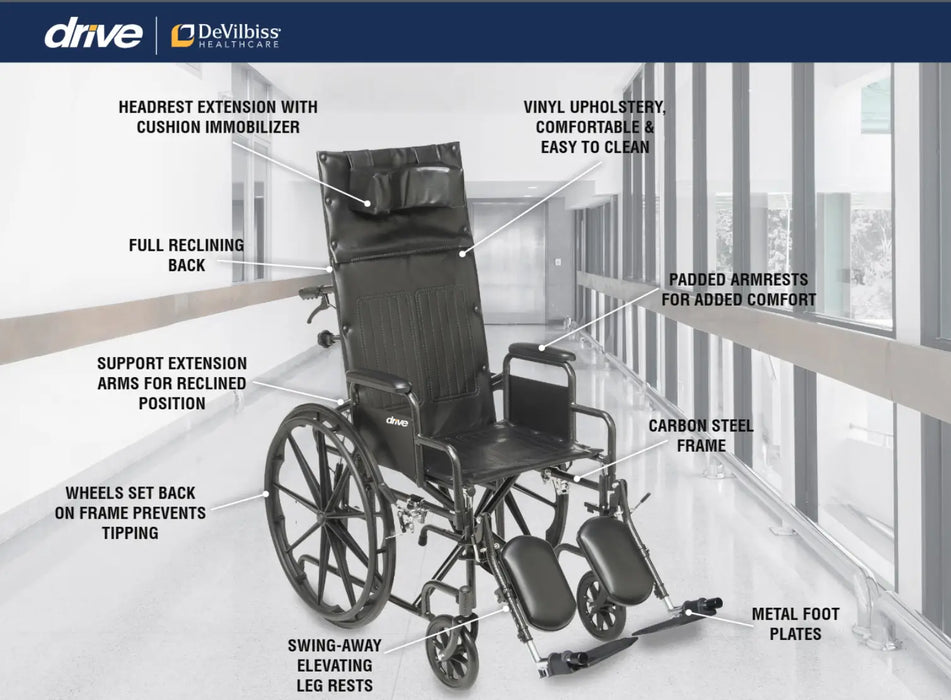 A DeVilbiss Drive siver sport reclining wheelchair shown in a bright modern hallway with callout labels pointing to features such as headrest extension, full reclining back, padded armrests, swing-away leg rests, and carbon steel frame.