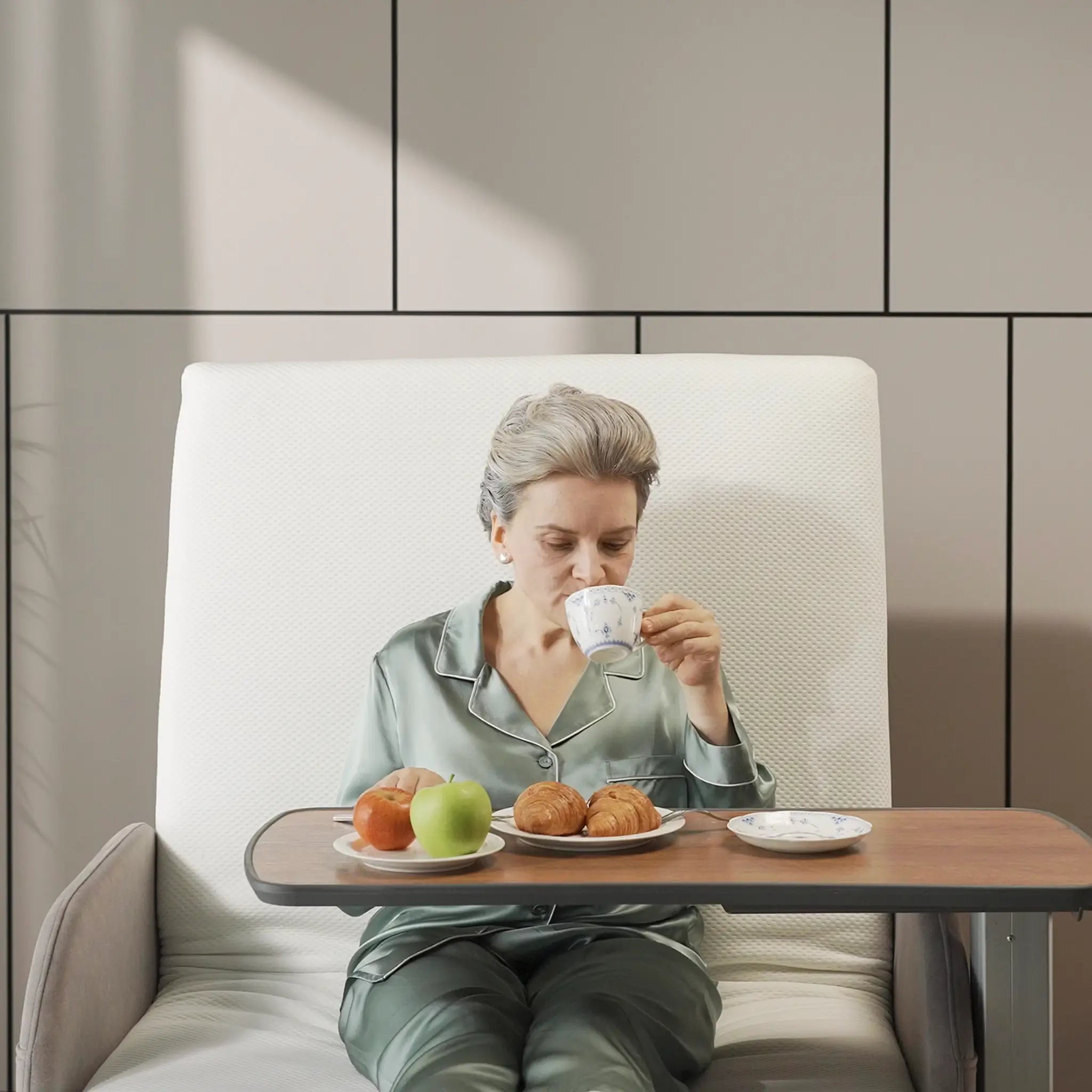 Orin Rotating Bed Raised Back with Person Eating in the bed front View