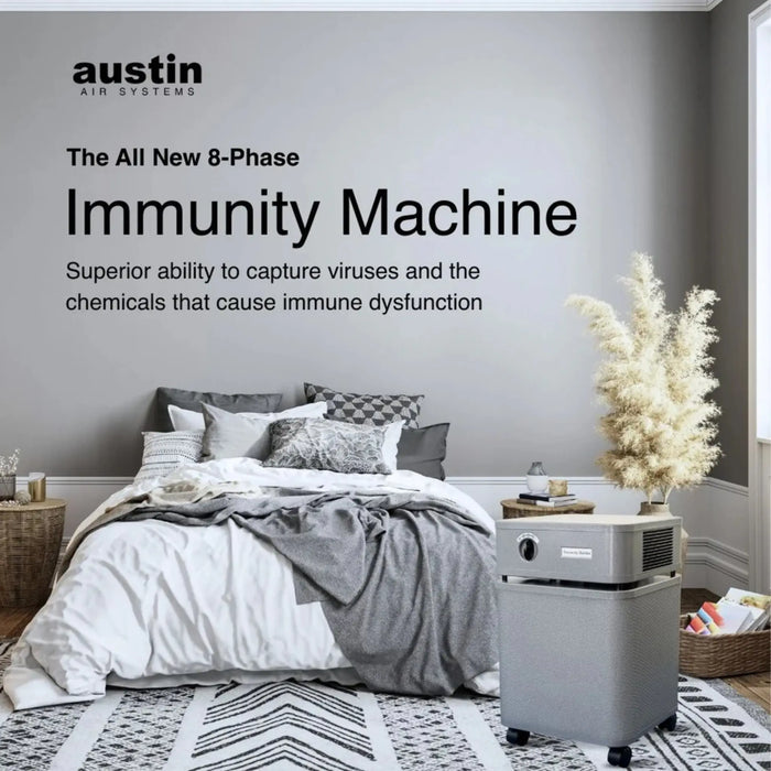 Austin Air Immunity Machine air purifier in a bedroom with text describing 8-phase filtration and virus and chemical capture