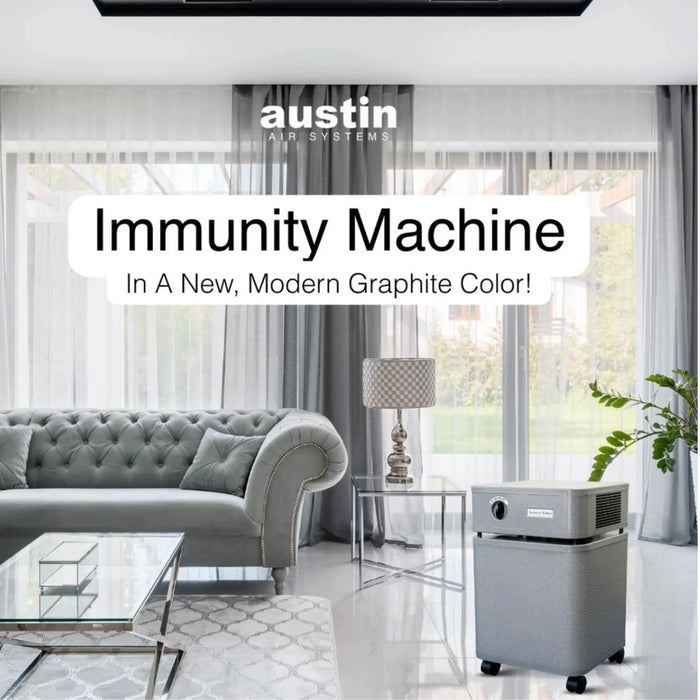 Austin Air Immunity Machine air purifier in a modern living room in graphite color