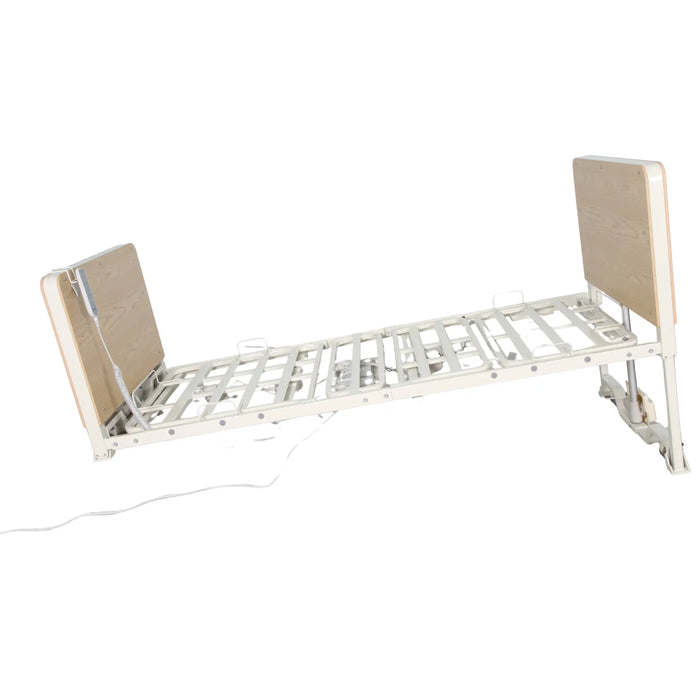 Wide view of CostCare B420 ultra low long term care bed in oak finish in ultra-low position with electric adjustment system