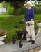 Drive Adjustable Height Rollator, Red, In Use Walking