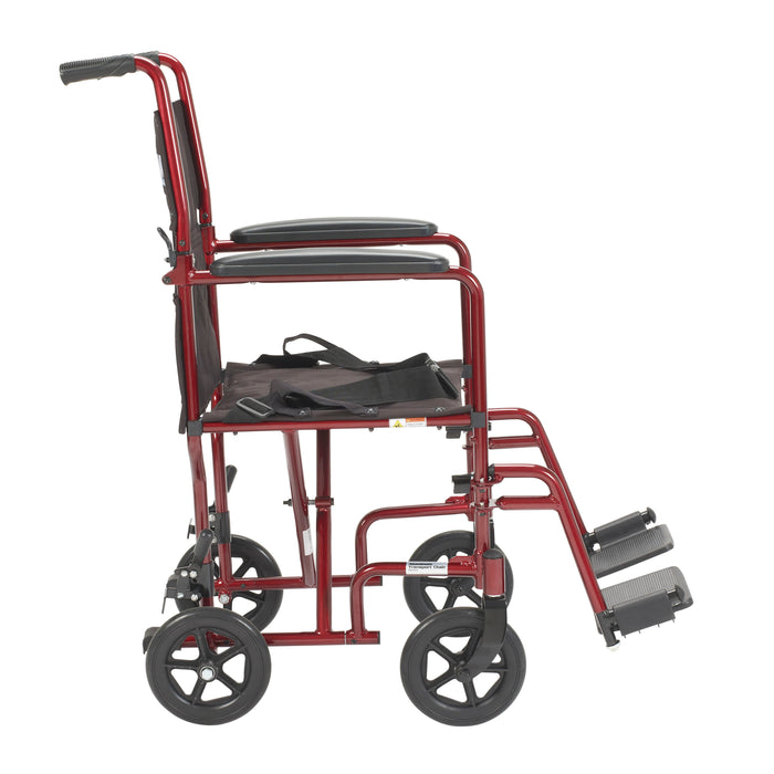 Red Drive aluminum transport chair in side view with the back upright, padded arms, and 8-inch wheels.