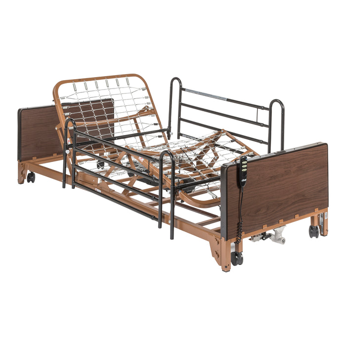 Drive Delta full electric hospital bed shown without a mattress and fitted with full-length side rails