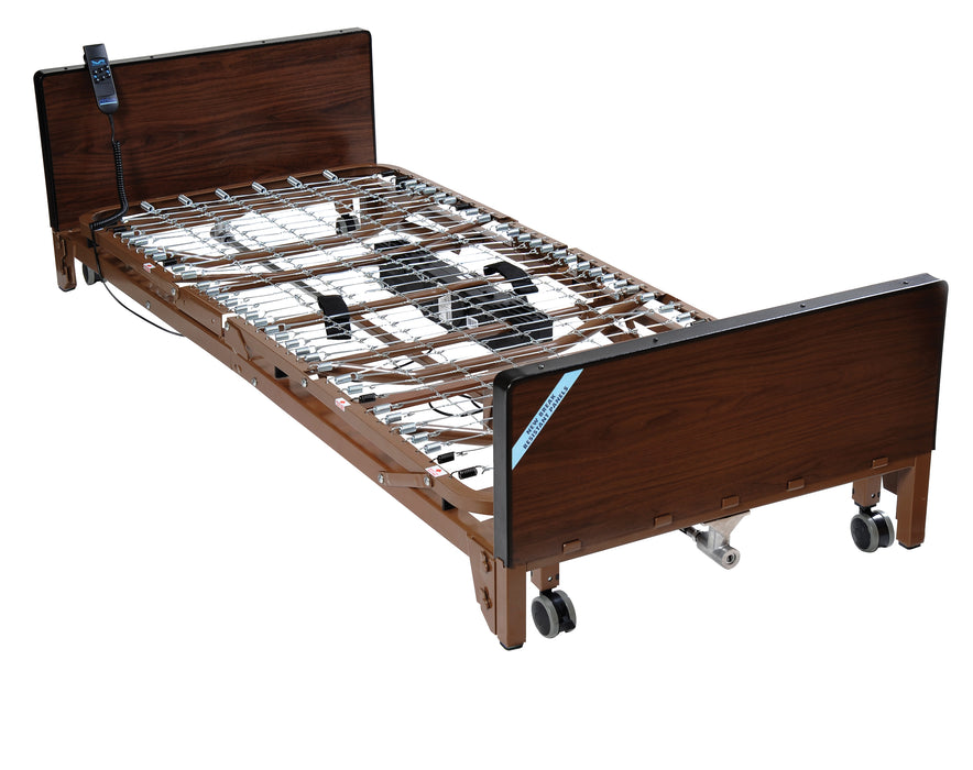 Drive Delta full electric low bed with a flat spring deck and wood-grain bed ends