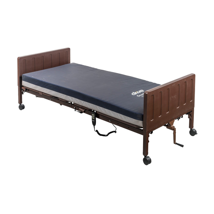 Drive Delta Pro adjustable homecare bed shown flat with a blue mattress and brown molded bed ends