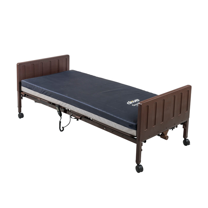 Drive Delta Pro electric hospital bed shown flat with a blue mattress and brown molded bed ends