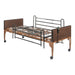 Drive electric hospital bed with full-length side rails viewed from the front corner