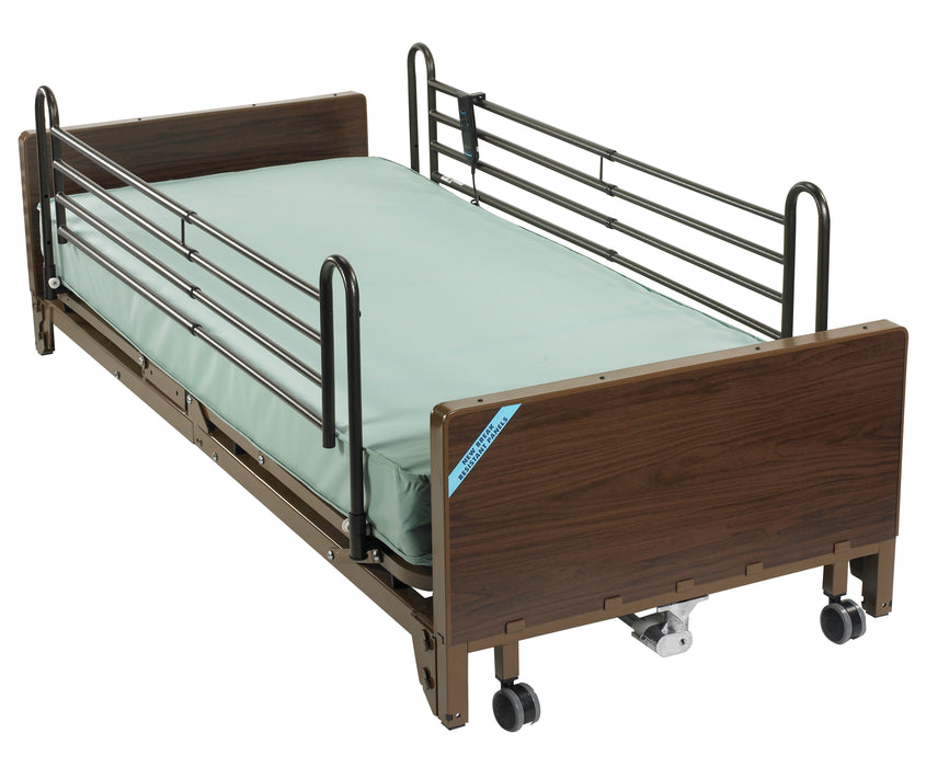 Drive full electric low bed with a gray-green mattress and full-length side rails