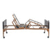 Side view of the Drive fully electric hospital bed with raised head and foot sections