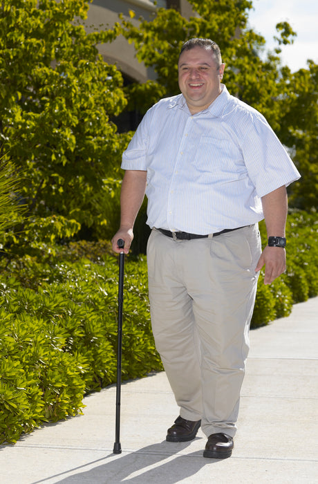 Drive Medical heavy-duty folding cane in use