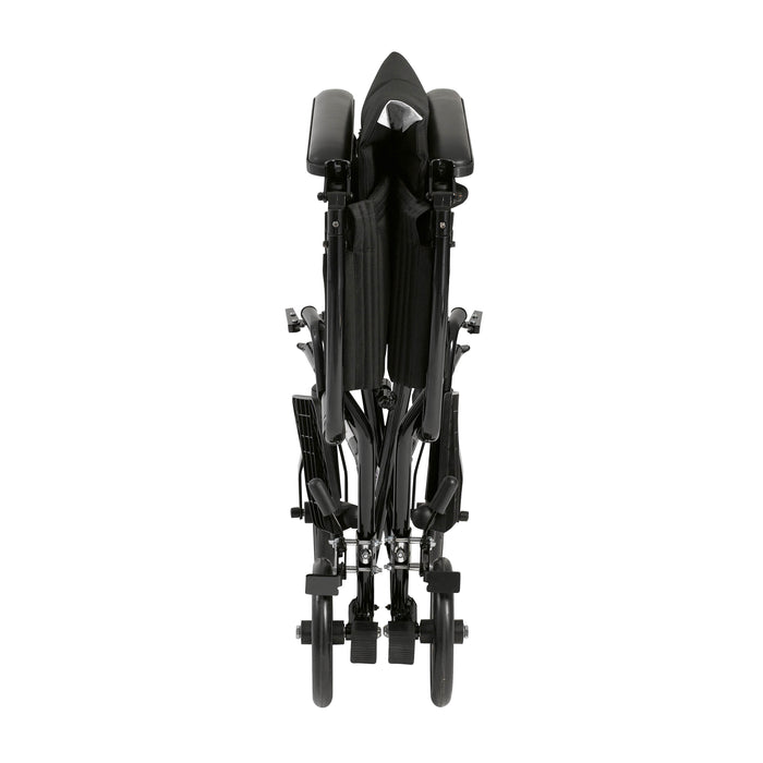 Black Drive Lightweight Transport Chair folded to a narrow profile for compact storage and transport.