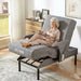 EZLift Bed Deluxe Sleep To Stand Bed in Zero Gravity Position with a senior woman reclining comfortably while using a remote control, promoting pressure relief, circulation, and full-body relaxation.