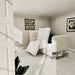 EZLift Bed Elevra Deluxe Rotating Hi-Lo Lift Bed positioned in a residential bedroom, shown from the doorway with the bed rotated into a seated transfer position for easy access.
