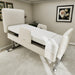 EZLift Bed Elevra Deluxe Rotating Hi-Lo Lift Bed raised to an elevated platform height, demonstrating adjustable height functionality for caregiver assistance and safer transfers.