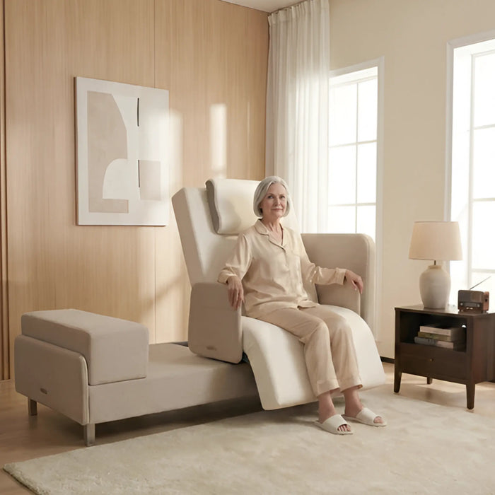 Older adult seated comfortably in the chair position of the EZLift Bed Elevra Rotating Adjustable Bed in a modern bedroom, demonstrating safe transfer and standing assistance.