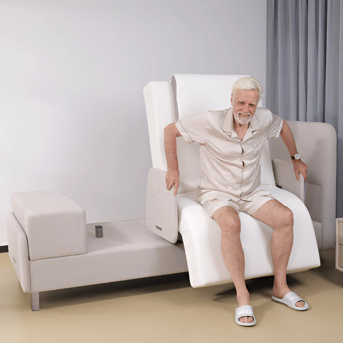 Older adult using the EZLift Bed Elevra Rotating Adjustable Bed in chair position to safely transition from sitting to standing.