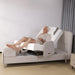 Older adult relaxing in the Zero Gravity position on the EZLift Bed Elevra Rotating Adjustable Bed while using the wired remote control.