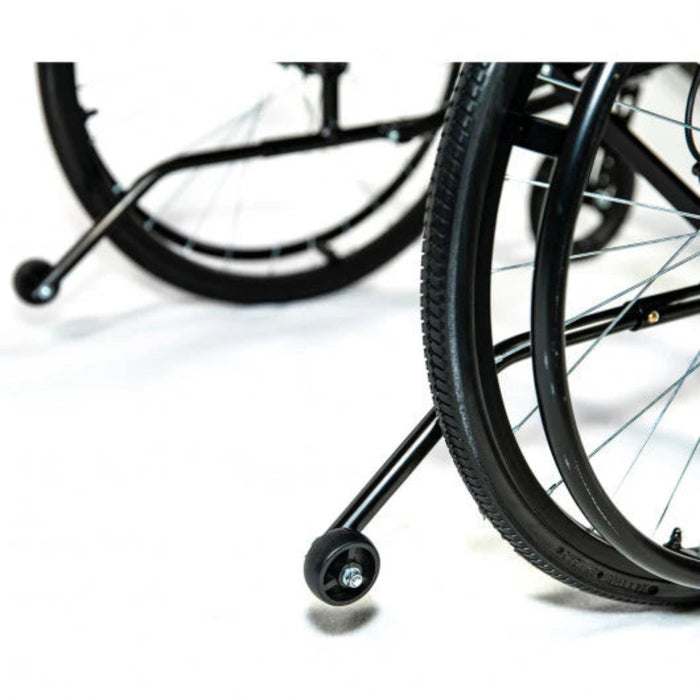 Close-up of a wheelchair with a blurred background ant tippers feather mobility