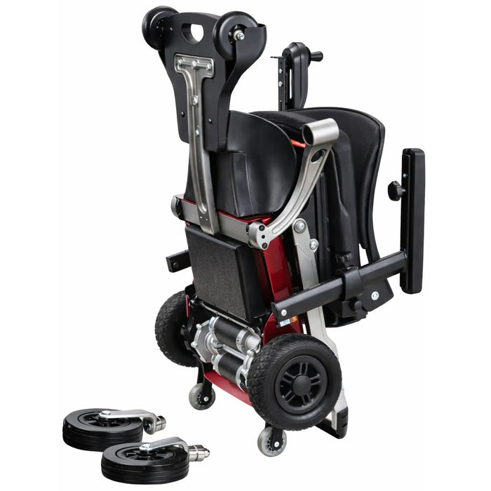 FreeRider Luggie portable travel power wheelchair folded upright with removable front wheels