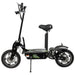 Green GIO Cobra foldable seated electric scooter featuring off-road tires, adjustable seat, front suspension, and compact folding frame displayed in side view on a white background.