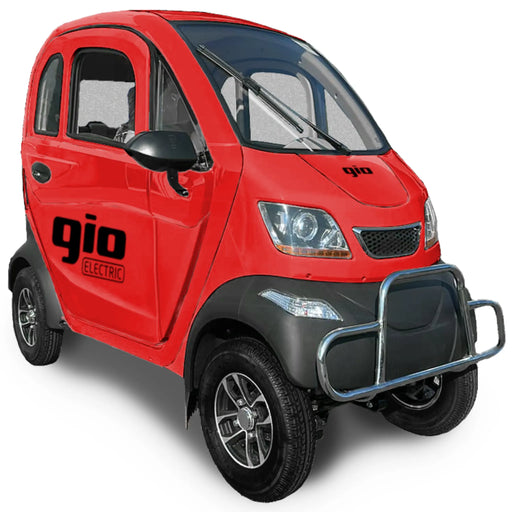 Red GIO Enclosed Mobility Scooter featuring enclosed cabin, front protective bumper, windshield wiper, and compact electric transportation design.