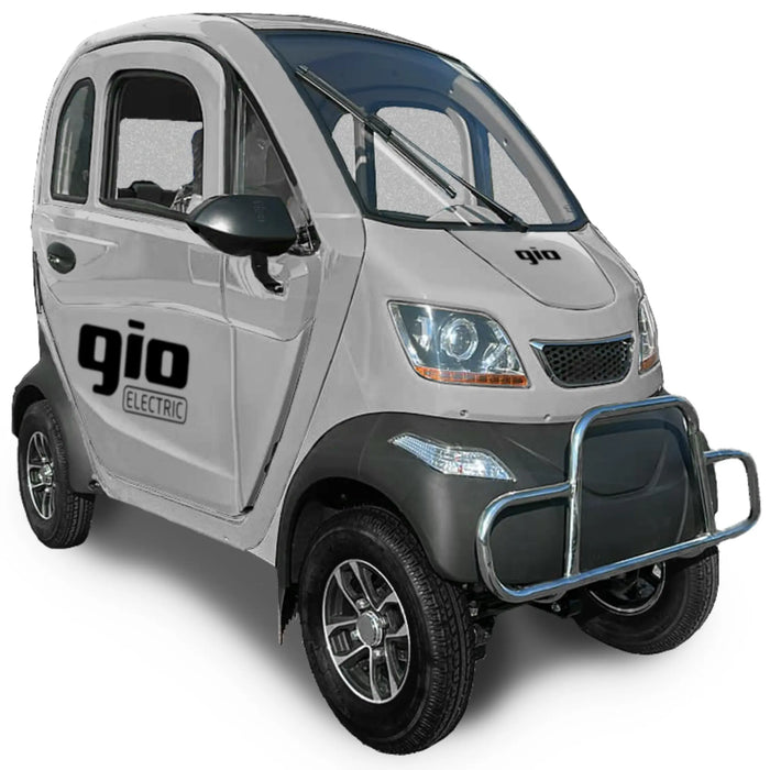 Silver GIO Enclosed Mobility Scooter with enclosed cabin, front bumper bar, windshield wiper, and three-wheel electric mobility configuration.