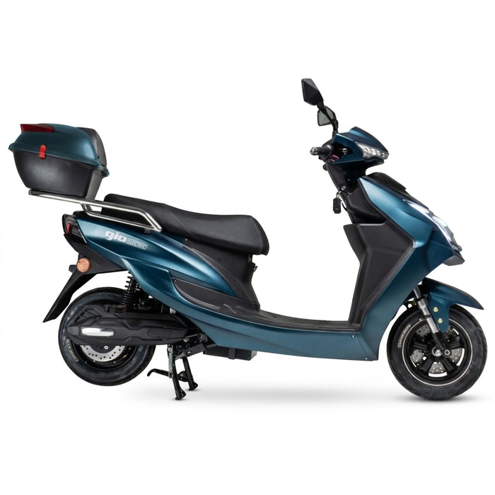 Side view of the blue GIO Phoenix PR Moped-Style Electric Scooter with rear storage trunk, sleek urban body styling, black comfort seat, and compact commuter design.