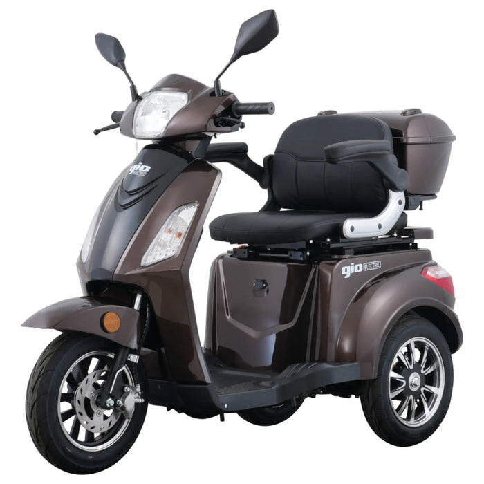 Front three-quarter view of the brown GIO Regal 3-Wheel Mobility Scooter featuring padded captain seat, rear storage box, mirrors, and front wheel suspension.