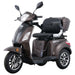 Front three-quarter view of the brown GIO Regal 3-Wheel Mobility Scooter featuring padded captain seat, rear storage box, mirrors, and front wheel suspension.