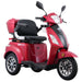 Studio image of the red GIO Regal 3-Wheel Mobility Scooter with a windshield, showing the padded seat with armrests, rear cargo compartment, LED front lights, and sporty three-wheel design.