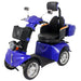 Angled front-side view of blue GIO Tron Pro 4-Wheeled Smart Mobility Scooter featuring padded captain seat, headrest, front basket, LED headlight, mirrors, and four-wheel chassis.