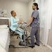 Handicare QuickMove seated bedside transfer with caregiver