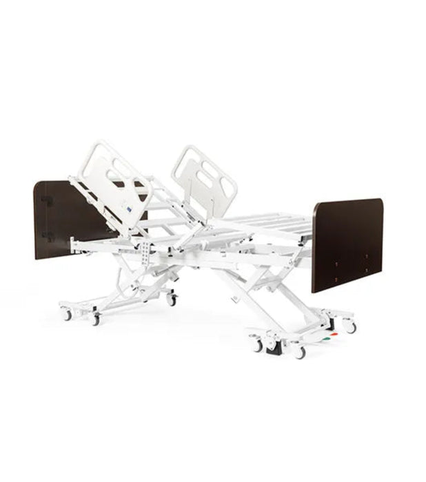 White hospital bed with various attachments on a white background Medacure DLX600-CLS Bariatric Full-Electric Bed